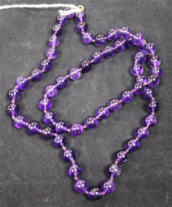 A single strand amethyst bead necklace, 26in.